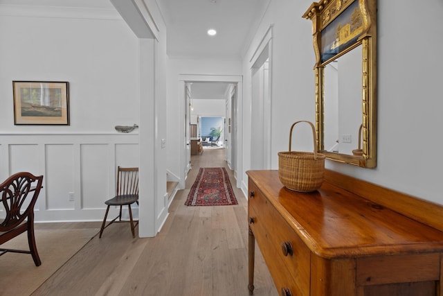 1557 Kepley Dr, Mount Pleasant, SC 29464 - corridor with light wood finished floors, a decorative wall, and a wainscoted wall