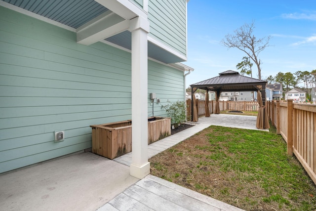 view of yard featuring a gazebo and a patio