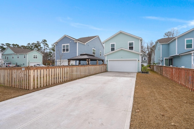 view of front of house with a gazebo and a garage