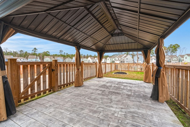 wooden terrace with a gazebo