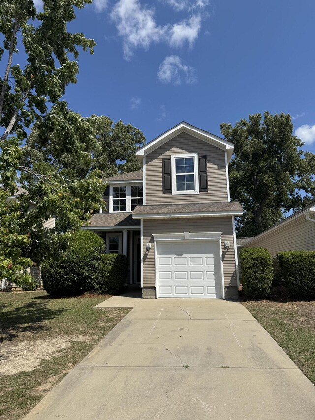 1208 N University Dr Unit A, Ladson, SC 29456 - traditional home with concrete driveway and an attached garage