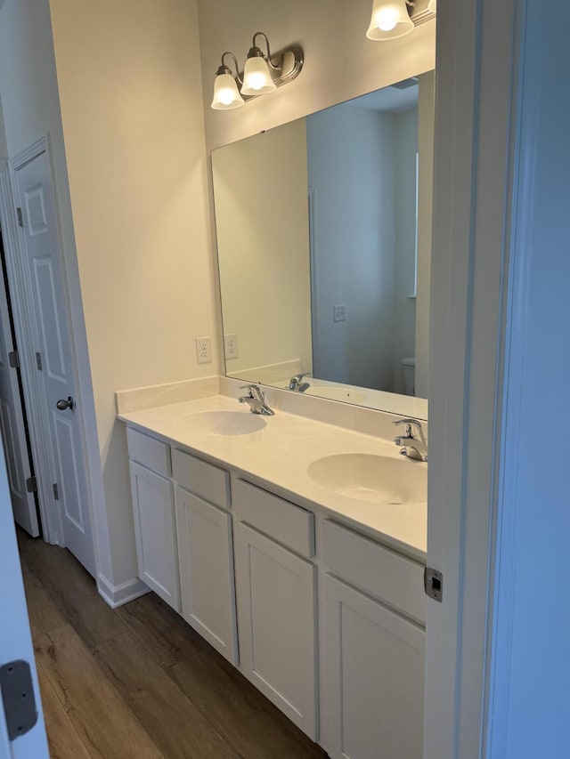 1208 N University Dr Unit A, Ladson, SC 29456 - full bath featuring wood finished floors, a sink, double vanity, and toilet