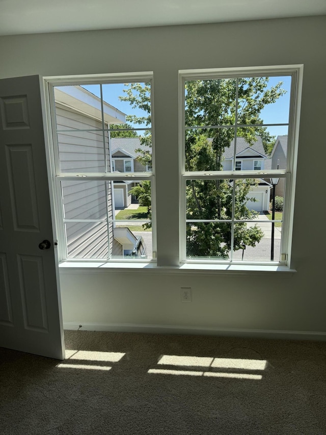 1208 N University Dr Unit A, Ladson, SC 29456 - carpeted empty room with plenty of natural light and baseboards