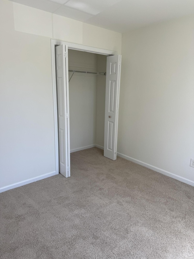 1208 N University Dr Unit A, Ladson, SC 29456 - unfurnished bedroom with baseboards, carpet floors, and a closet