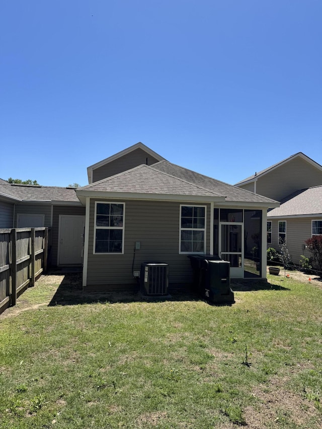 1208 N University Dr Unit A, Ladson, SC 29456 - rear view of property with fence, a lawn, a sunroom, and central AC unit