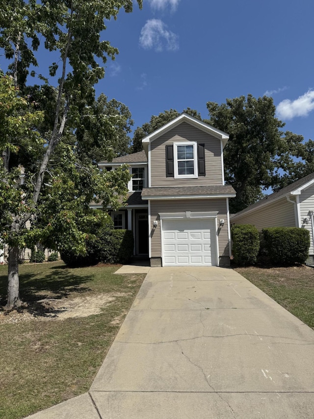 1208 N University Dr Unit A, Ladson, SC 29456 - view of front of home with a garage, roof with shingles, a front lawn, and concrete driveway
