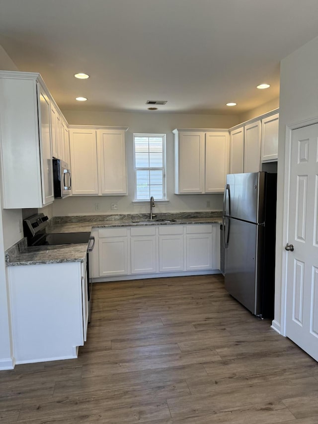 1208 N University Dr Unit A, Ladson, SC 29456 - kitchen with a sink, visible vents, recessed lighting, white cabinetry, and appliances with stainless steel finishes