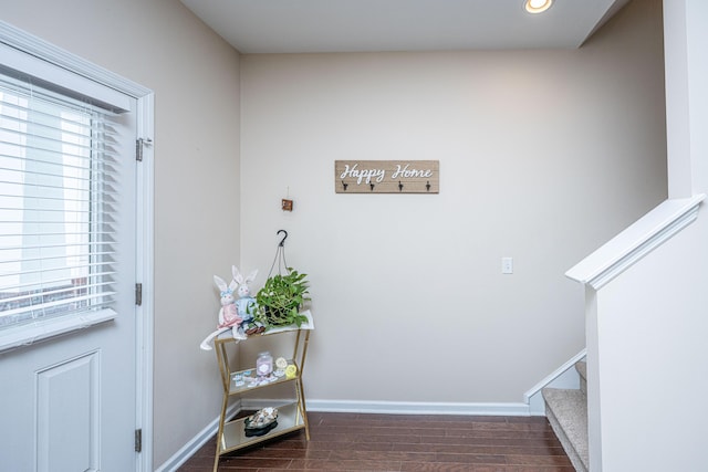 foyer entrance featuring recessed lighting, stairs, baseboards, and wood finished floors