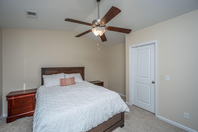 bedroom with visible vents, baseboards, light colored carpet, lofted ceiling, and a ceiling fan