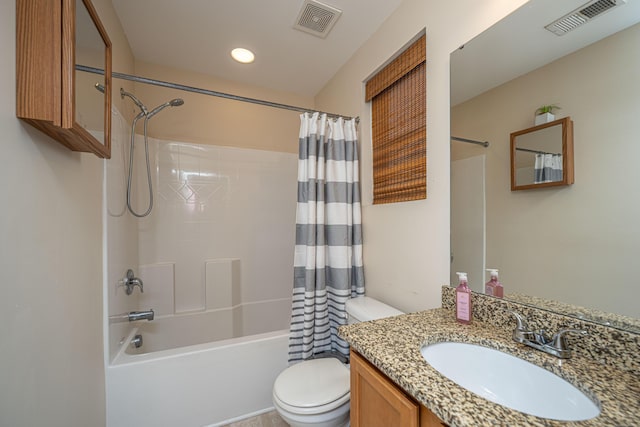 full bathroom with vanity, shower / bath combination with curtain, toilet, and visible vents