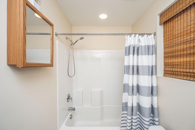 full bath with shower / bath combination with curtain