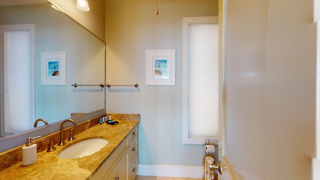 bathroom with vanity with extensive cabinet space