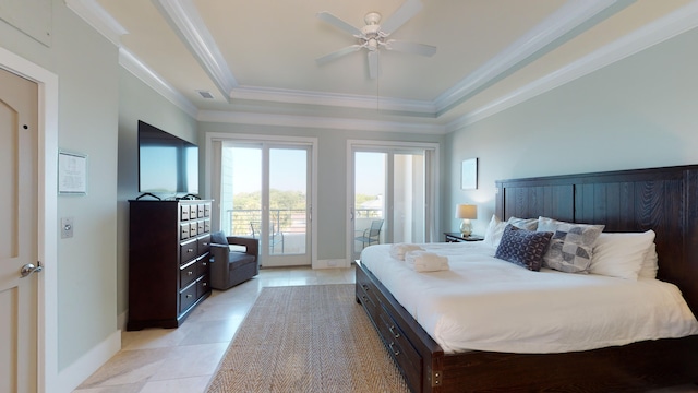 bedroom featuring light tile floors, ceiling fan, ornamental molding, a tray ceiling, and access to outside