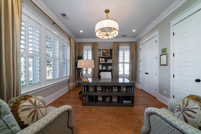 home office featuring baseboards, visible vents, an inviting chandelier, and ornamental molding