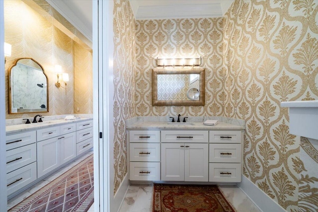 bathroom with wallpapered walls, baseboards, ornamental molding, and a sink