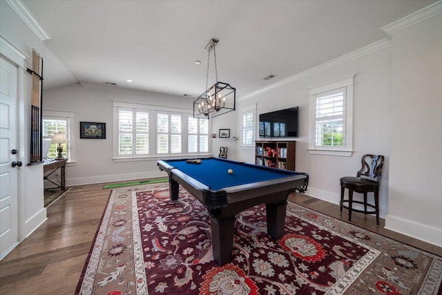 rec room featuring plenty of natural light, wood finished floors, and ornamental molding