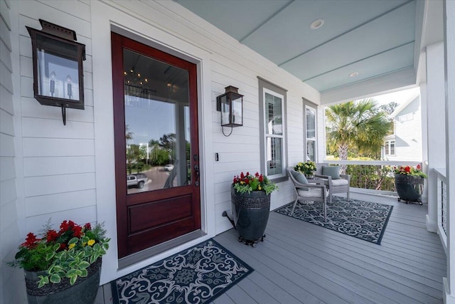 property entrance featuring covered porch