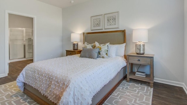bedroom featuring wood finished floors and baseboards