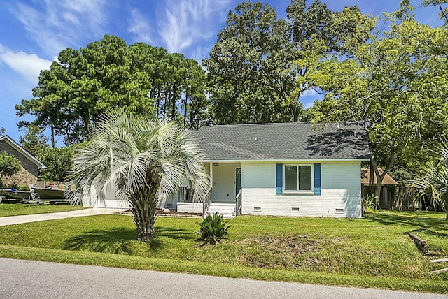 view of front of property featuring brick siding, a shingled roof, concrete driveway, crawl space, and a front yard