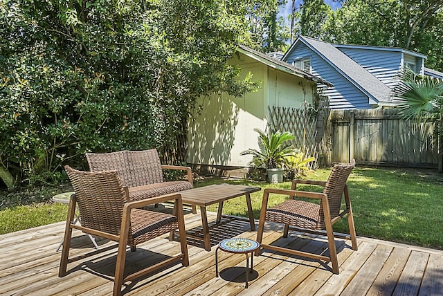 wooden deck with fence and a yard