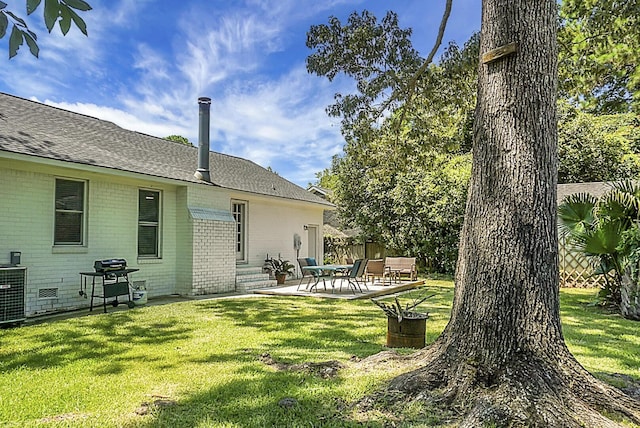 view of yard with a patio area and fence