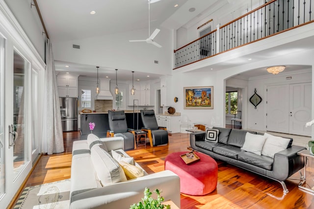371 Live Palmetto Blf, Mount Pleasant, SC 29464 - living room with light hardwood / wood-style floors, high vaulted ceiling, and ceiling fan