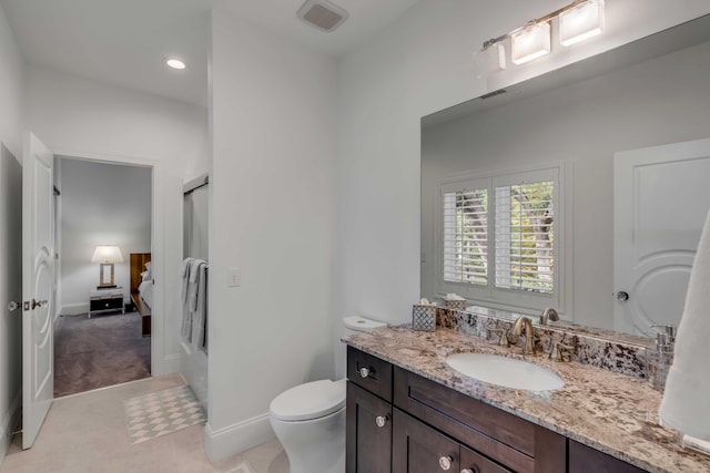 371 Live Palmetto Blf, Mount Pleasant, SC 29464 - bathroom featuring tile patterned flooring, vanity, toilet, and a shower with shower door