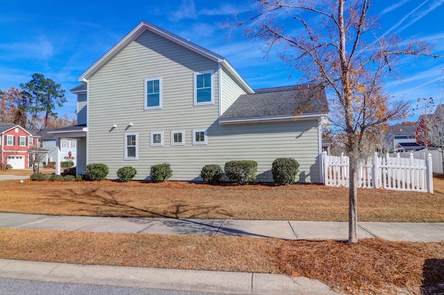 exterior space featuring a front lawn