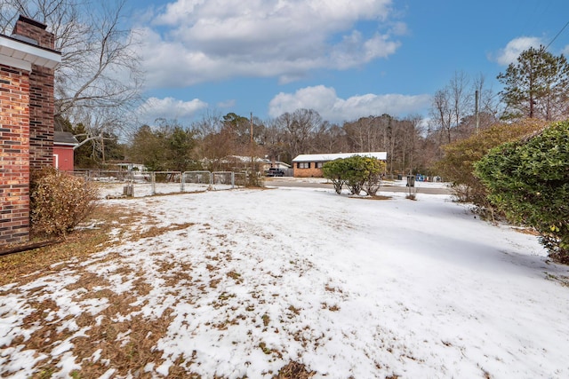 view of snowy yard