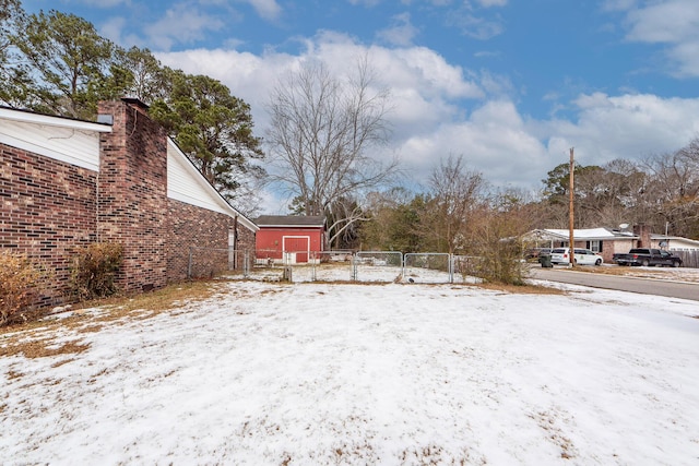 view of yard covered in snow