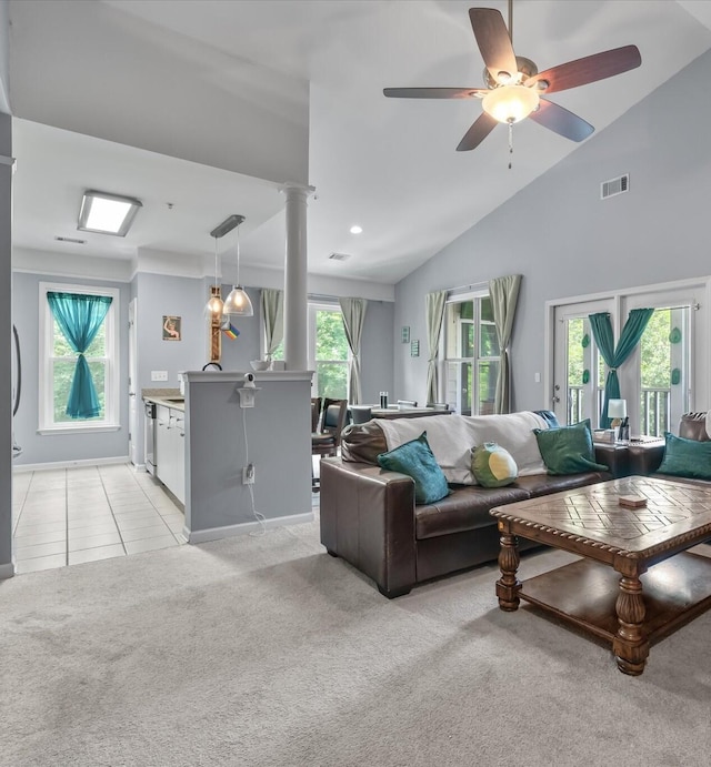 2632 Egret Crest Ln, Charleston, SC 29414 - living room with light colored carpet, lofted ceiling, a ceiling fan, and decorative columns