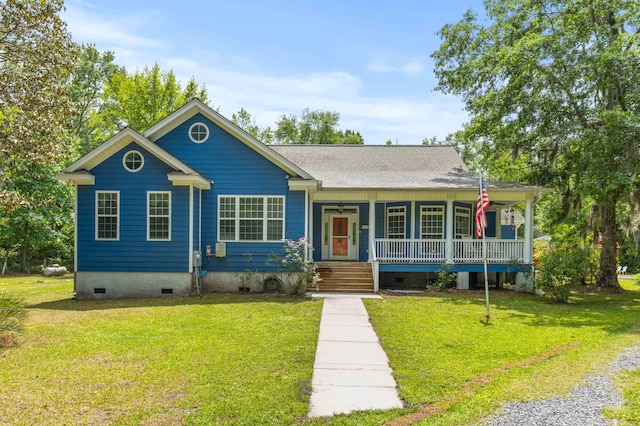 view of front of property with crawl space, covered porch, a front lawn, and a shingled roof