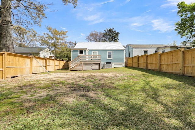 view of yard with a wooden deck