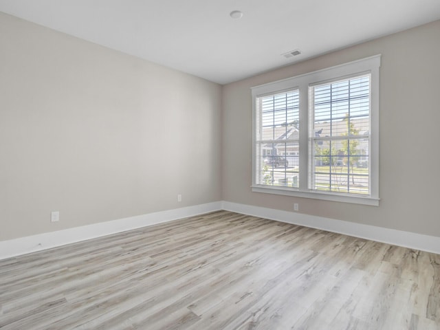 253 River Martin Ct, Summerville, SC 29483 - spare room with baseboards, visible vents, and wood finished floors