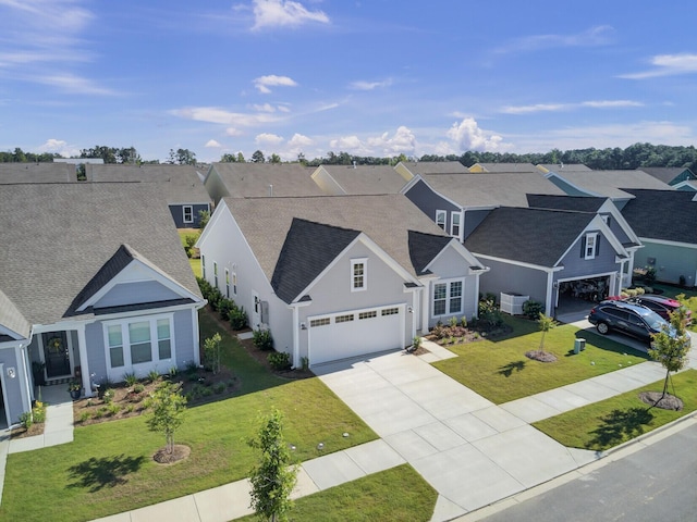 253 River Martin Ct, Summerville, SC 29483 - view of front of property with driveway, a front yard, roof with shingles, an attached garage, and a residential view