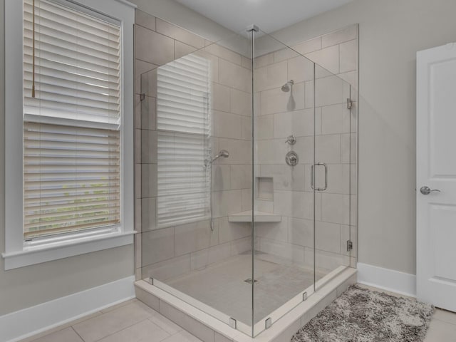 253 River Martin Ct, Summerville, SC 29483 - bathroom featuring a shower stall, tile patterned floors, and baseboards