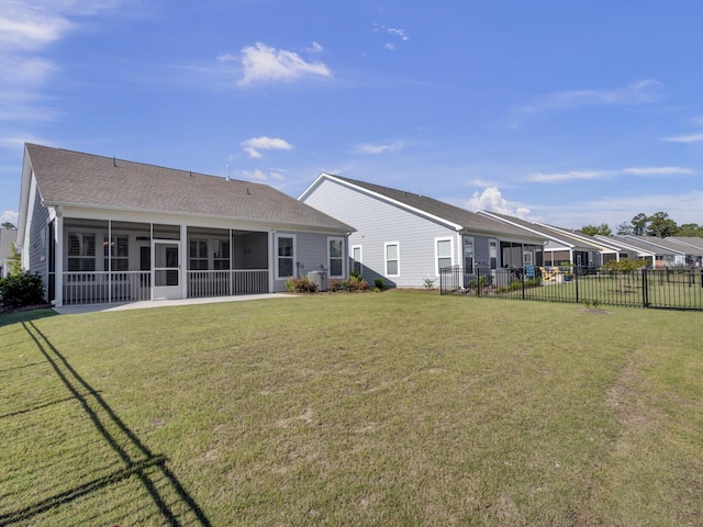 253 River Martin Ct, Summerville, SC 29483 - rear view of property featuring a shingled roof, a sunroom, fence, and a yard
