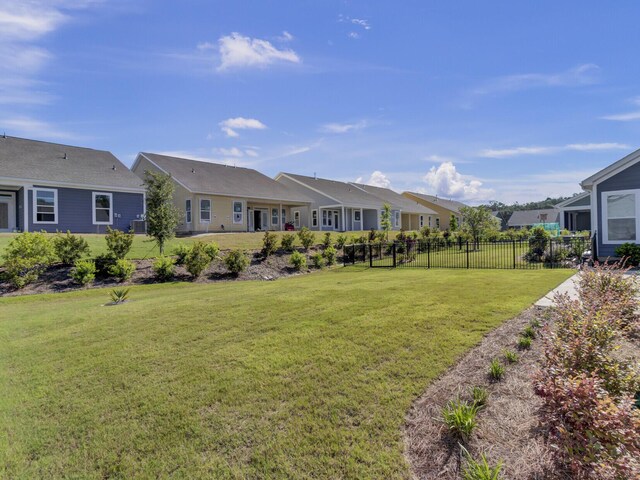 253 River Martin Ct, Summerville, SC 29483 - view of yard with a residential view and fence
