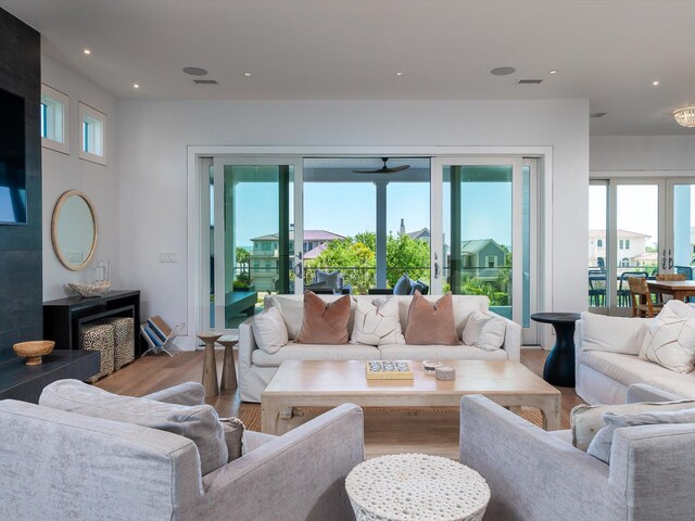 living room featuring recessed lighting and wood finished floors