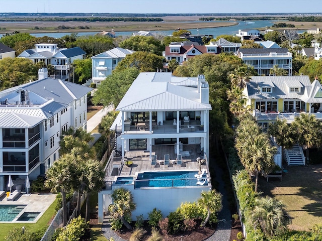 aerial view featuring a residential view and a water view