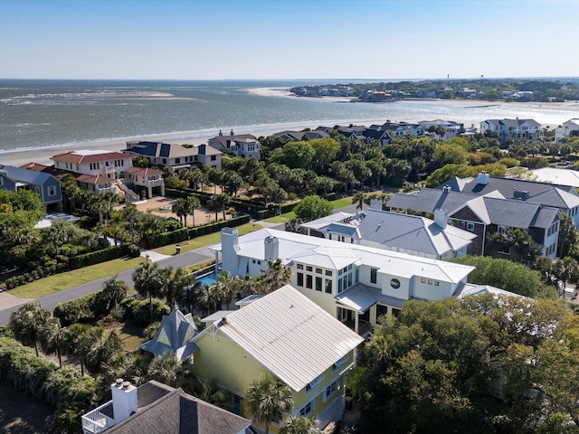 drone / aerial view with a water view and a residential view