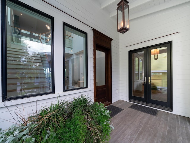 property entrance featuring french doors