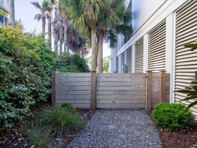 view of side of property with fence