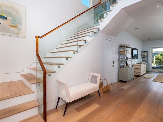 stairs with wood finished floors