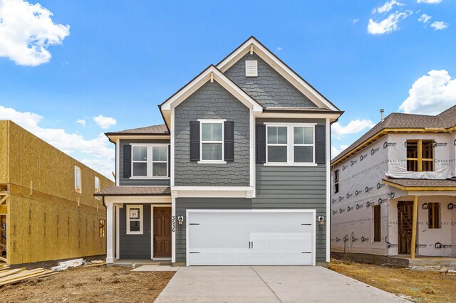 view of front of property with a garage