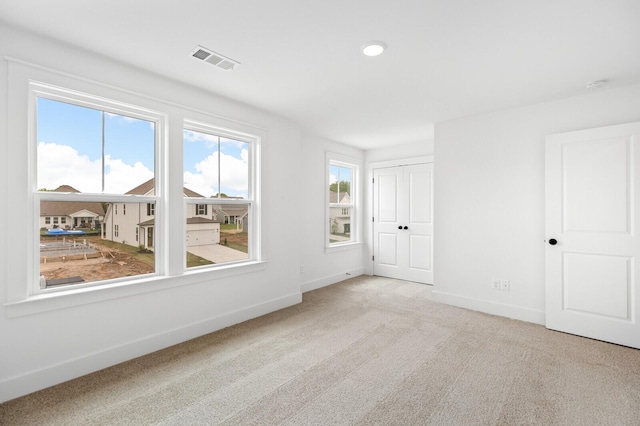 view of carpeted spare room