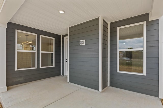 doorway to property with a porch