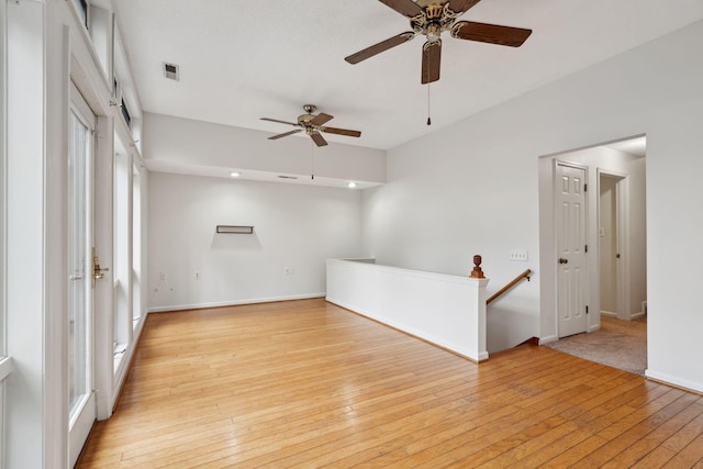 unfurnished room with light hardwood / wood-style floors