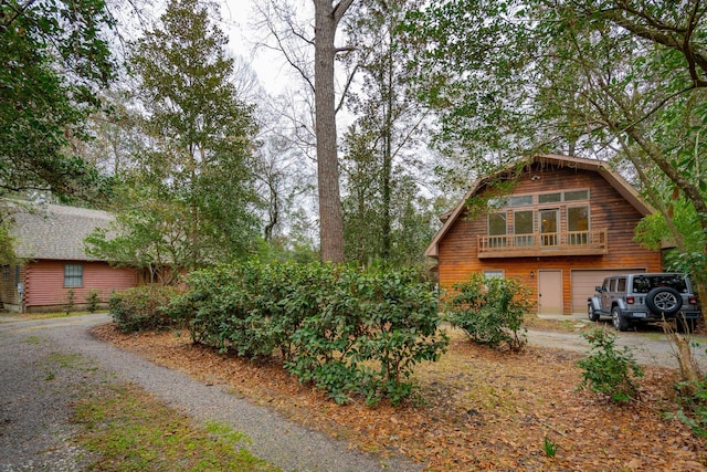 view of side of home with a garage