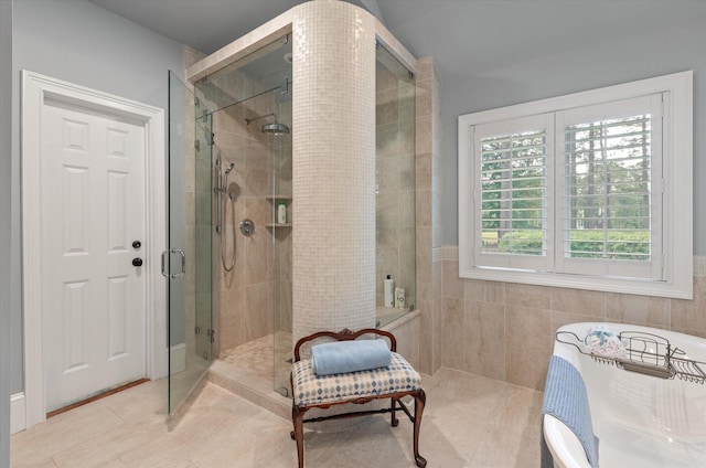bathroom featuring a shower stall and tile patterned floors